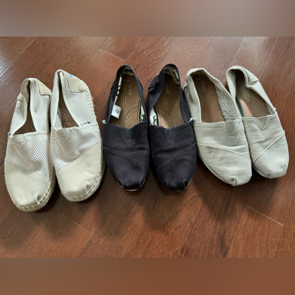 3 pairs of Toms shoes